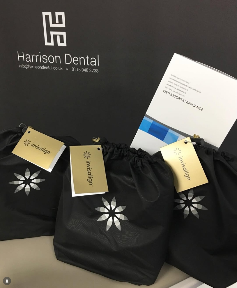 Invisalign aligner kits ready for Harrison Dental patients